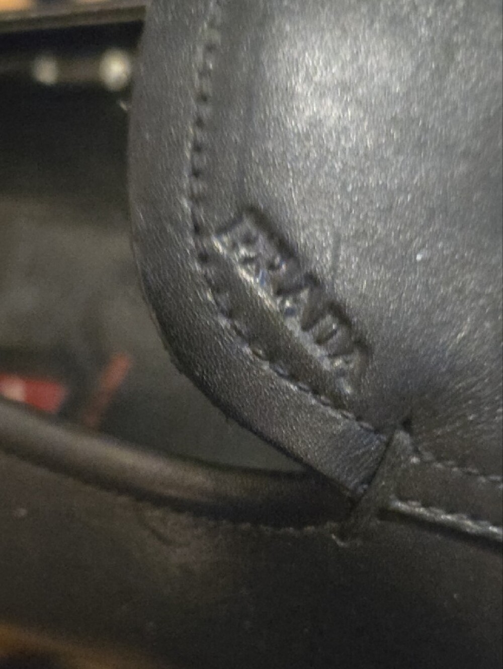 Prada Black Leather Slip-On Loafers with Red Insole Accent - Picture 3 of 5